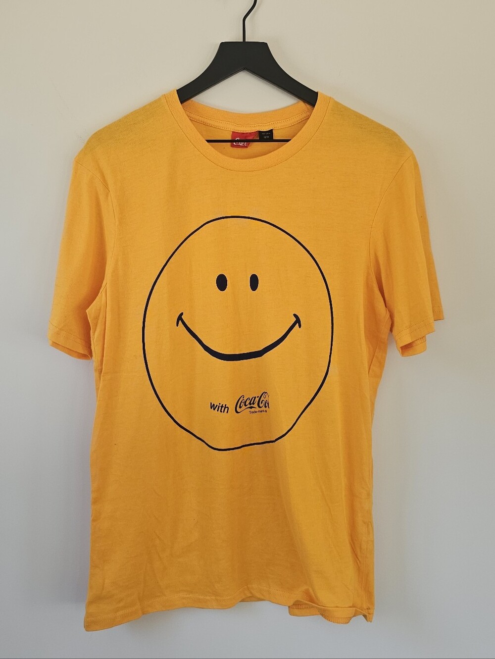 Coca Cola Men s Yellow Smiley Graphic Tee